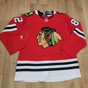Caleb Jones Chicago Blackhawks Fanatics Authentic Autographed Red Adidas